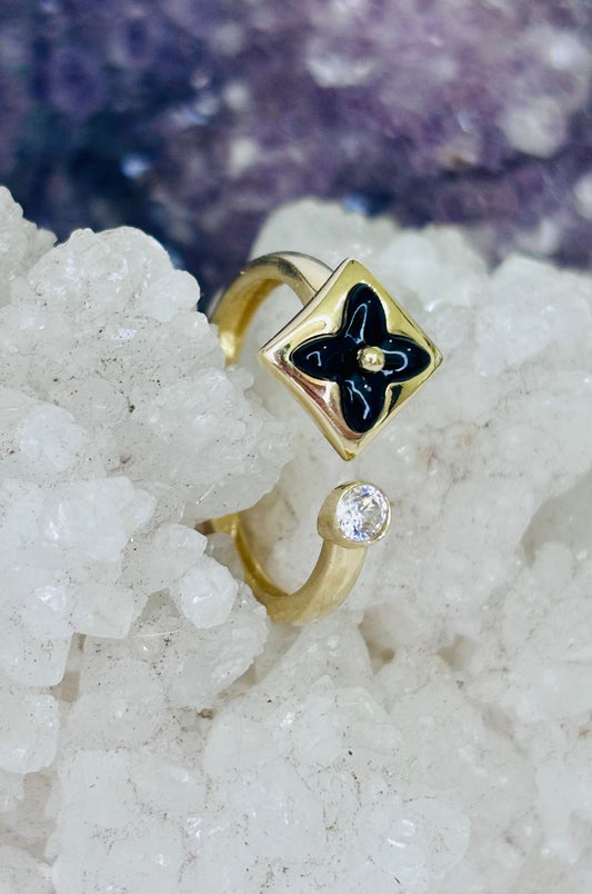 Anillo flor negra en oro italiano 10K