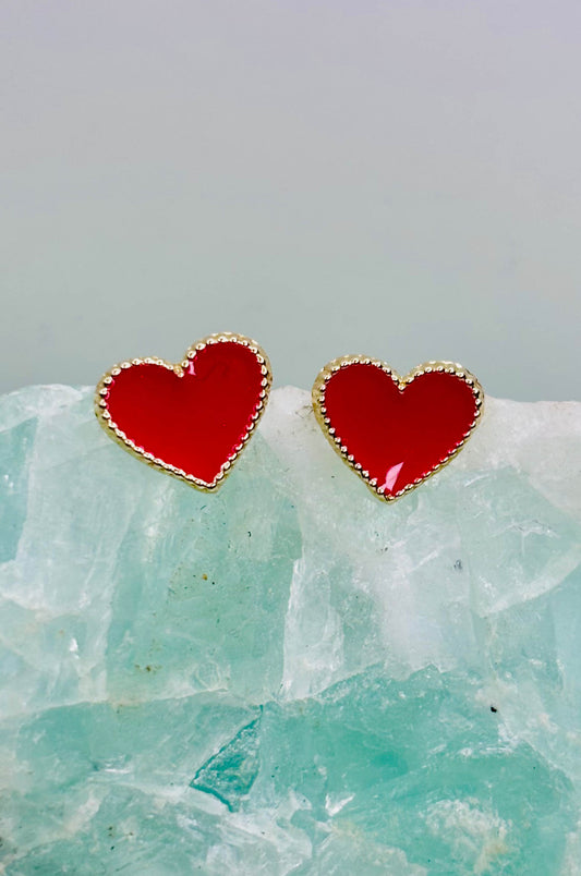 Aretes corazón en oro amarillo 14k con cerradura de bebé