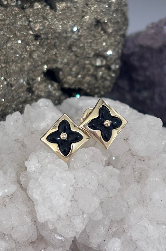 Aretes flor negra en oro italiano 10K