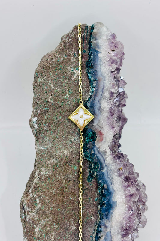 Pulsera de flor blanca en oro italiano 10k