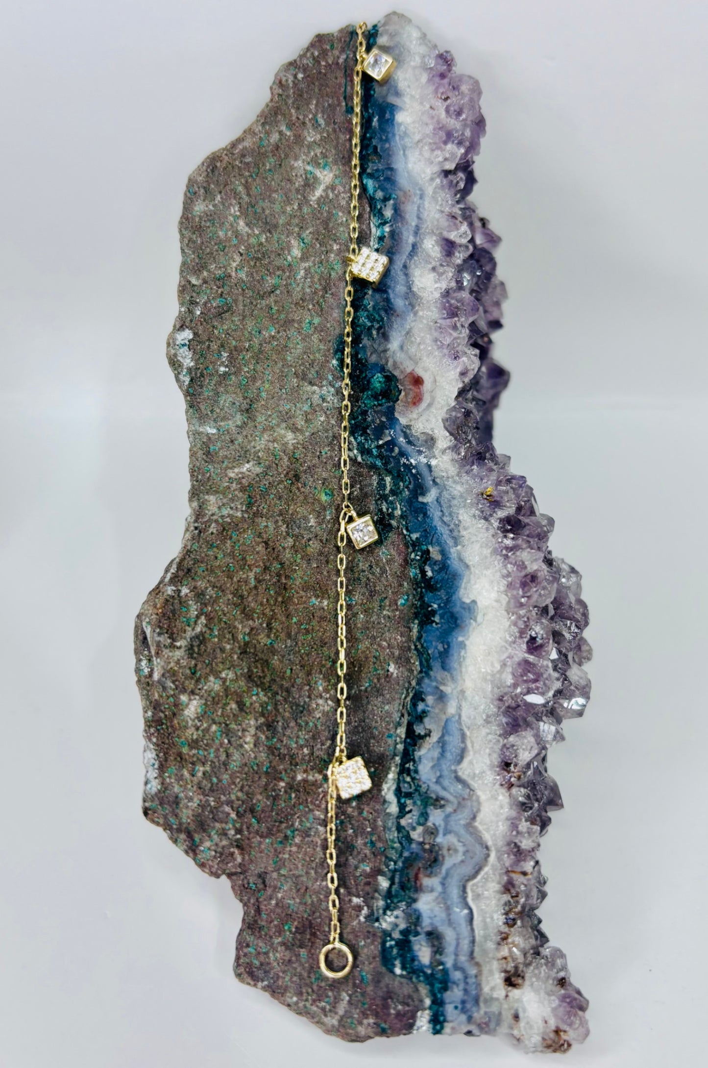 Pulsera zirconias princesa en oro amarillo 14K