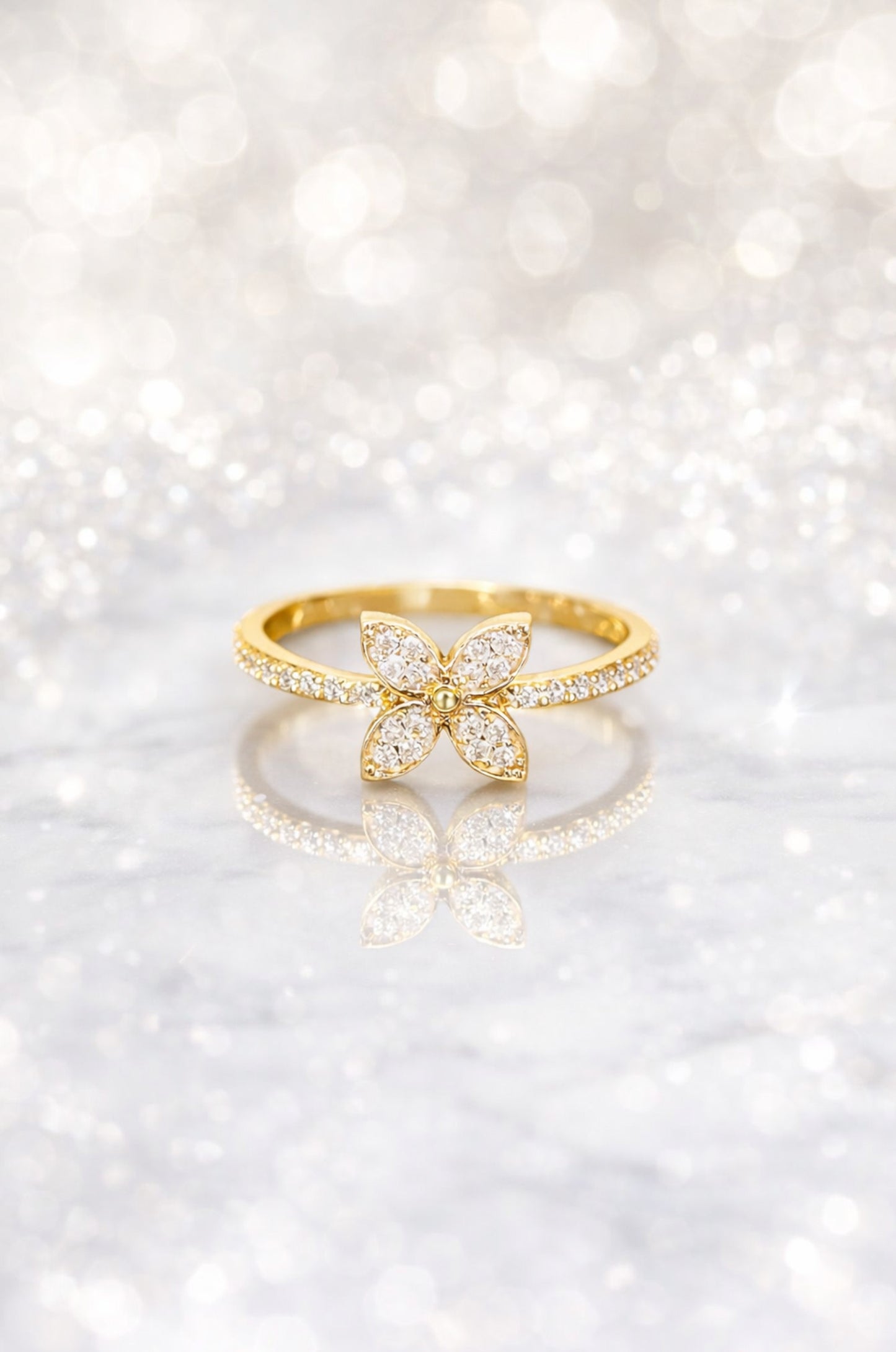 Anillo flor 4 pétalos en oro amarillo 14K