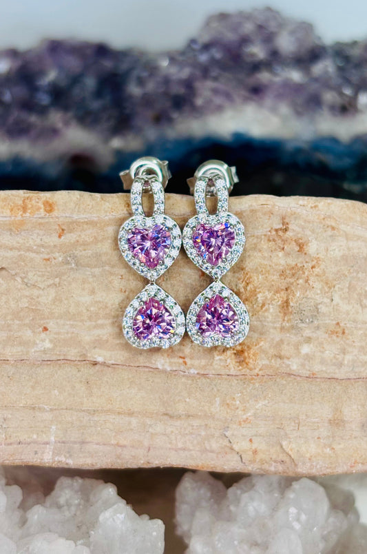 Aretes con zirconitas rosas corte corazón con cerradura de poste en plata 925