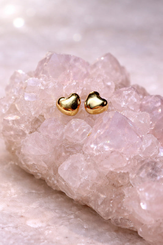 Aretes corazón en oro amarillo 10k con cerradura de bebé