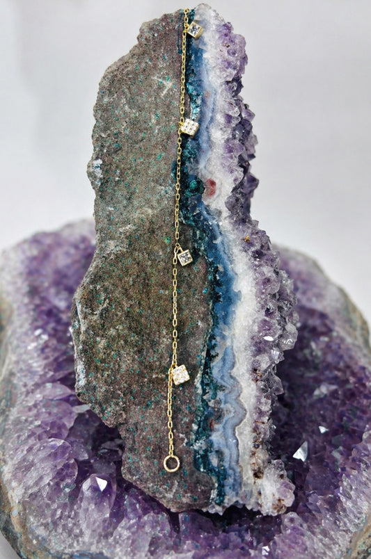 Pulsera zirconias princesa en oro amarillo 14K