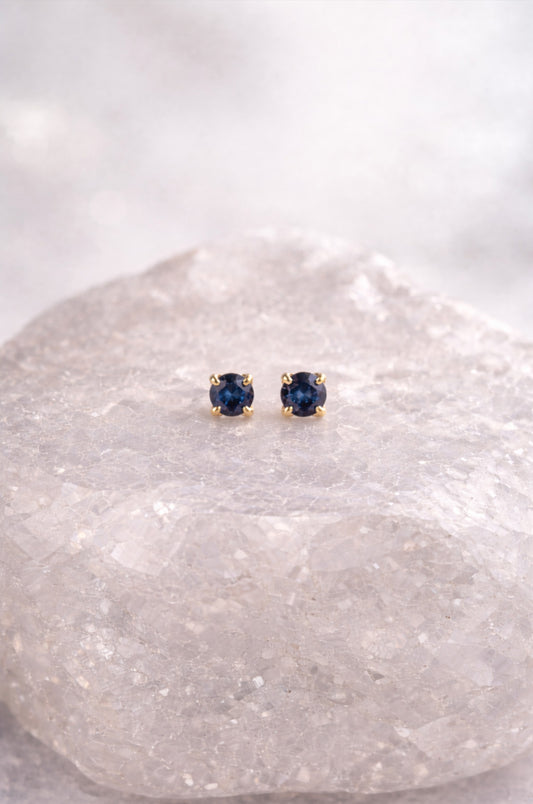 Aretes solitario azul en oro amarillo 14K